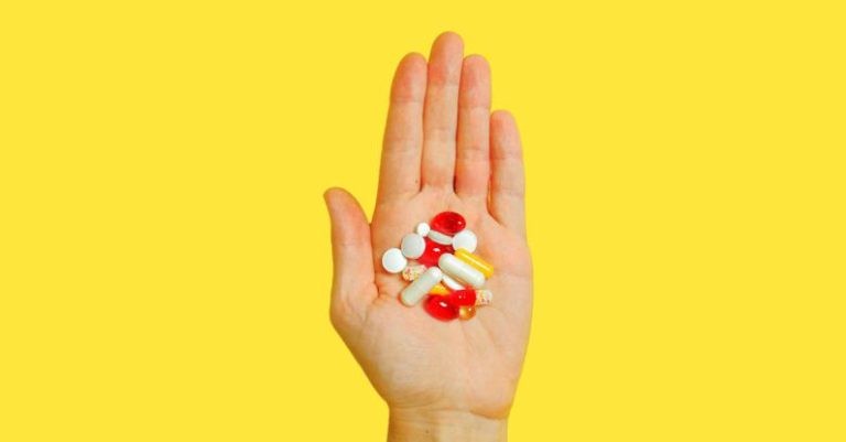 Vitamins - Person With Bunch Medication Pills on Hand