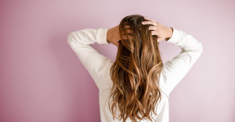 Hair Care - Woman Wearing White Long-sleeved Shirt