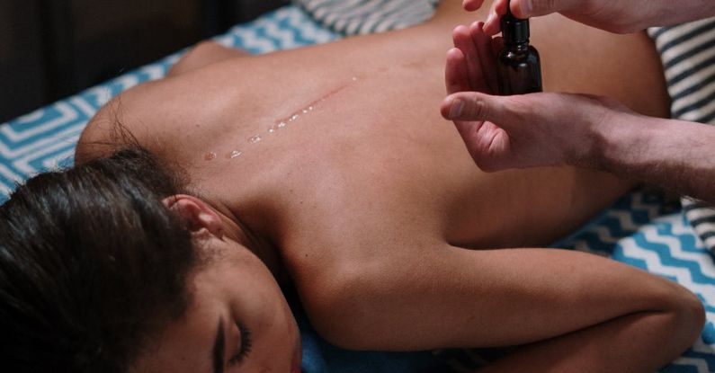 Hair Treatments - Man Lying on Blue and White Bed