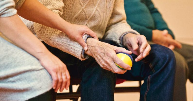 Care - Person Holding a Stress Ball